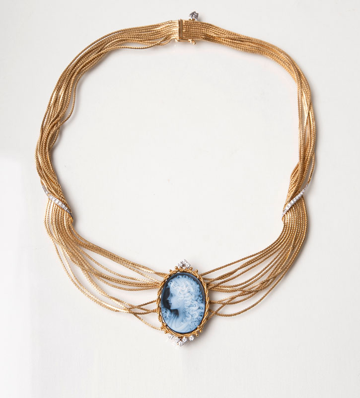A golden necklace with cameo pendant by Wellendorff