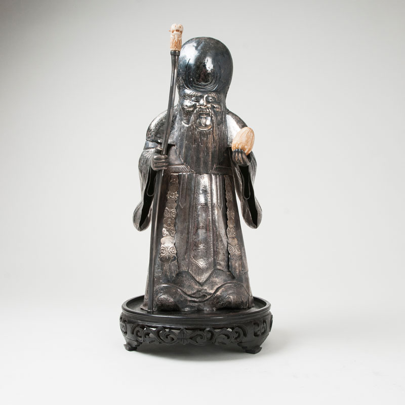 A rare tall silvered sculpture of 'Shoulao' with the peach of longevity