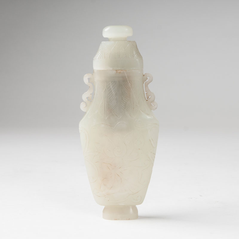 A small jade lidded vase