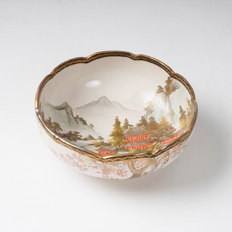 A Satsuma bowl with fine landscape decor
