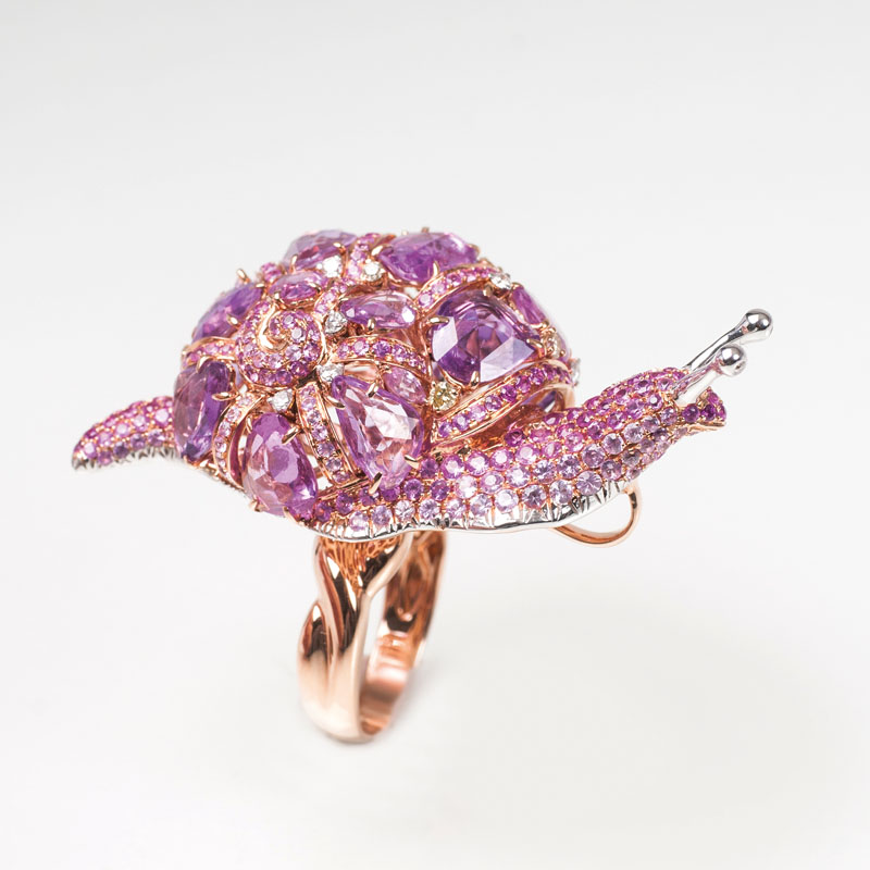 An extraordinary cocktailring with pink-sapphires, rubies and diamonds 'Snail'