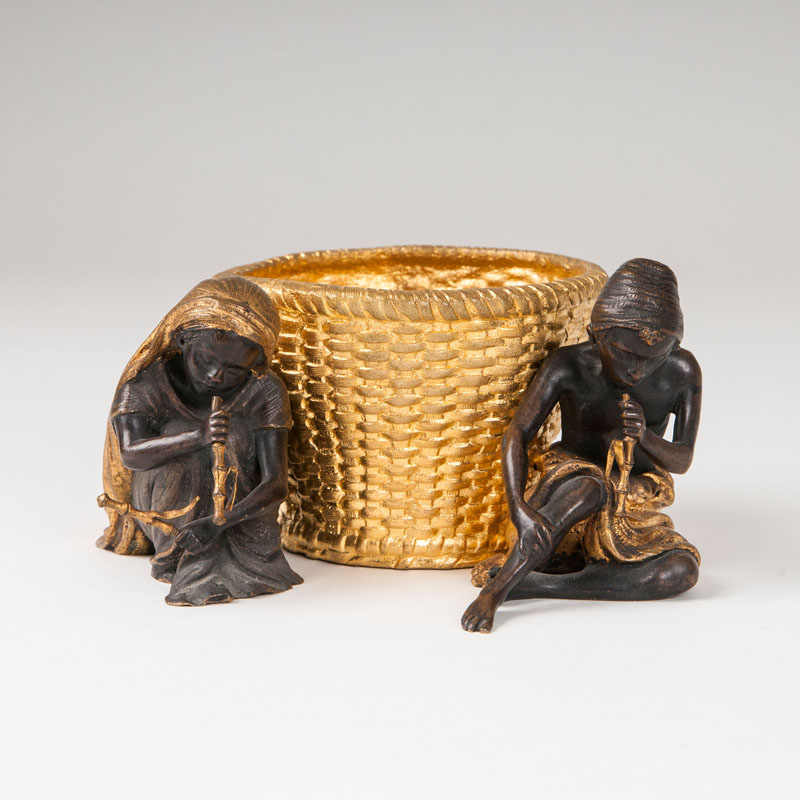 A Vienna bronze 'two music-making children with basket'