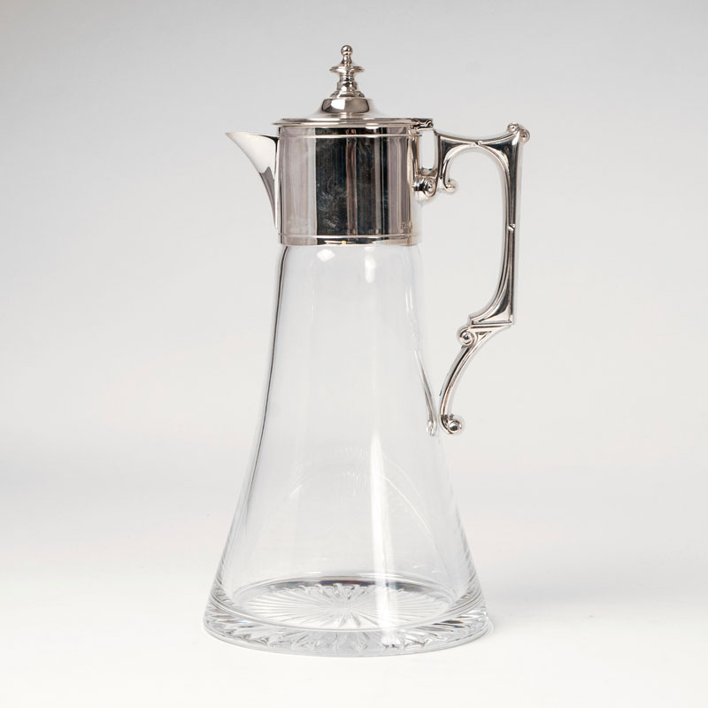 A splendid glass jug with silver mounting