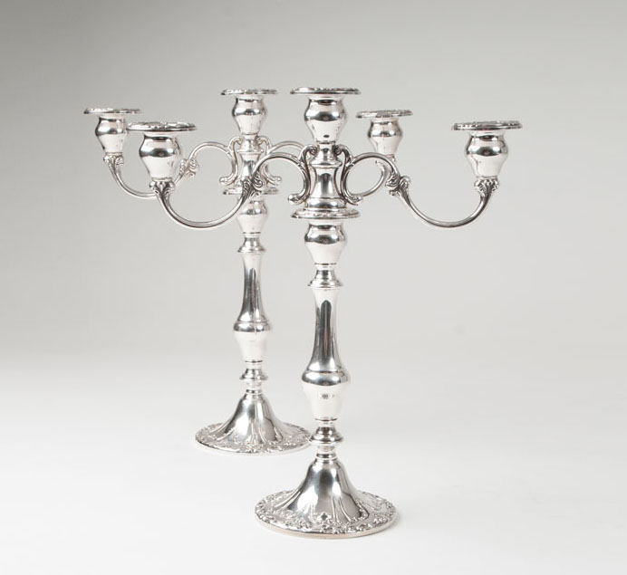 A pair of opulent candleabras