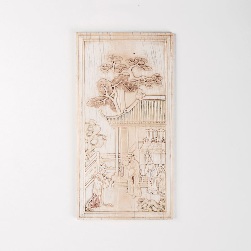 An ivory relief with garden scene