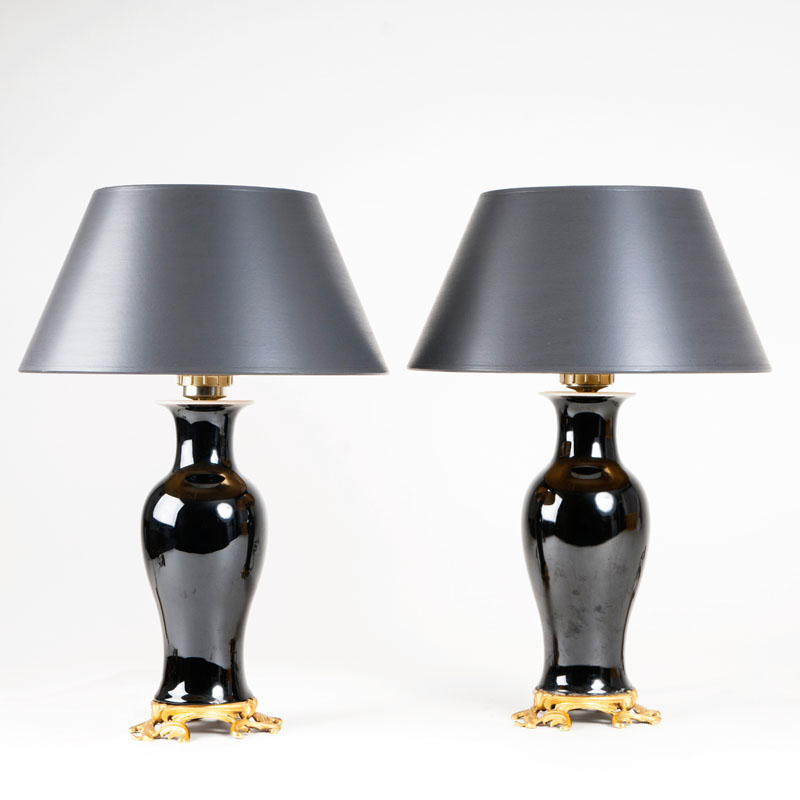 A pair of small porcelain table lamps