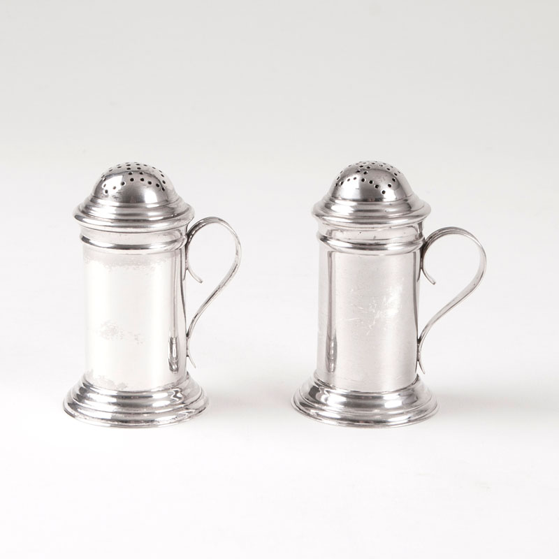 A pair of Victorian salt and pepper castors