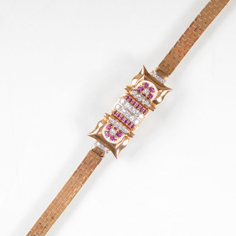 A Vintage ladie's wristwatch with diamonds and rubies by Bulova