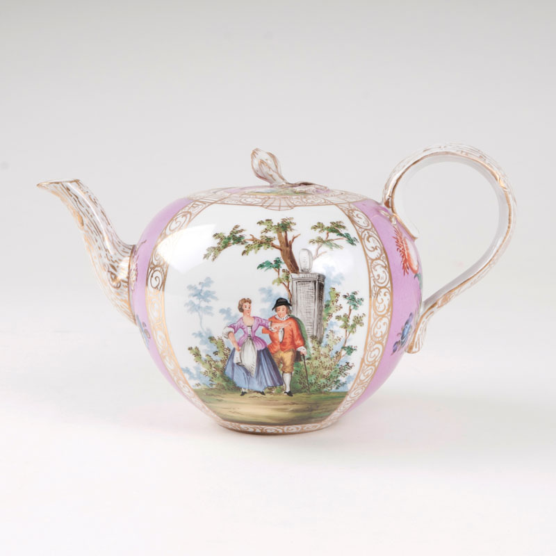 A teapot with scenes from Watteau