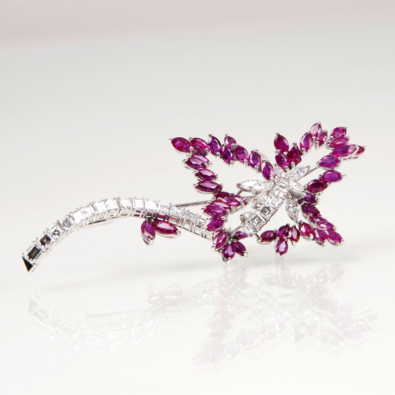 A highcarat flower brooch with diamonds and rubies A highcarat flower brooch with diamonds and rubies