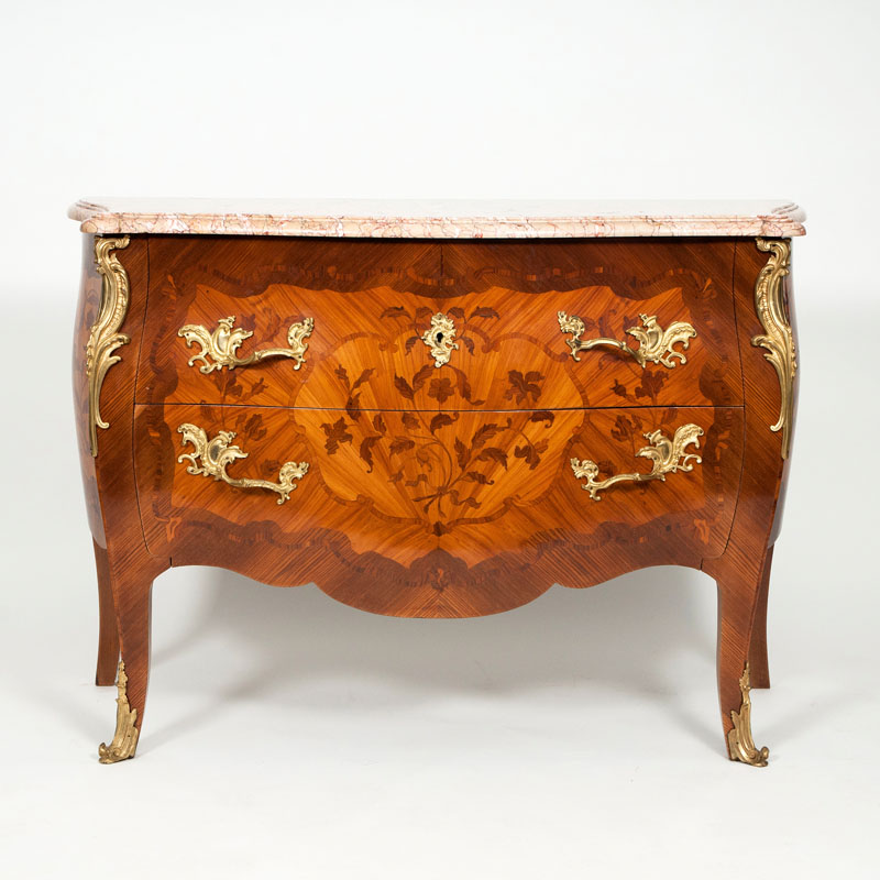 A stamped commode of Louis Quinze style
