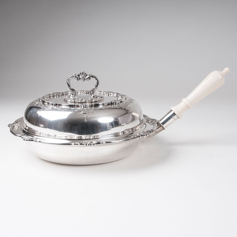 A serving bowl by Goldsmiths & Silversmiths Co.