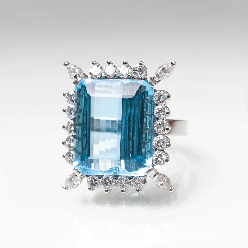 An aquamarine diamond ring