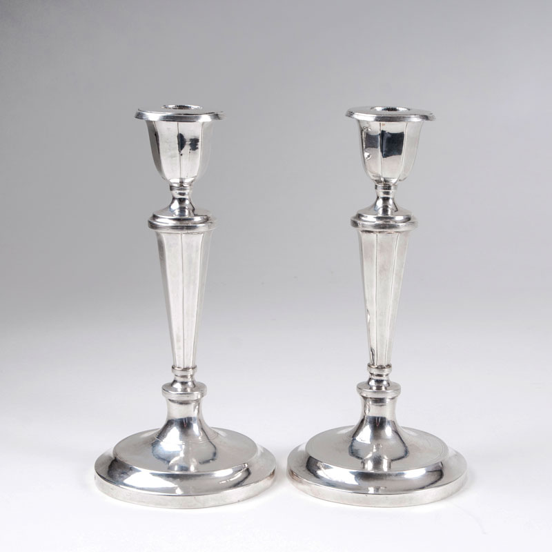 A pair of russian Empire table candle holders
