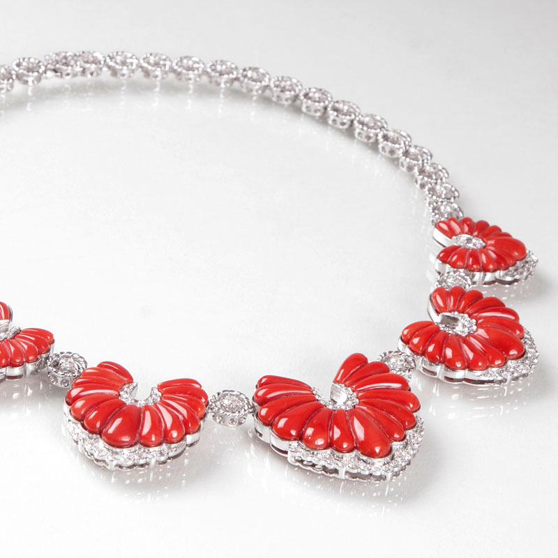 A highcarat diamond coral necklace in french Vintage style
