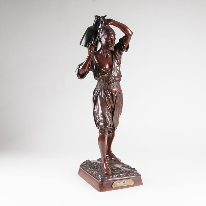 A bronze sculpture 'water carrier'