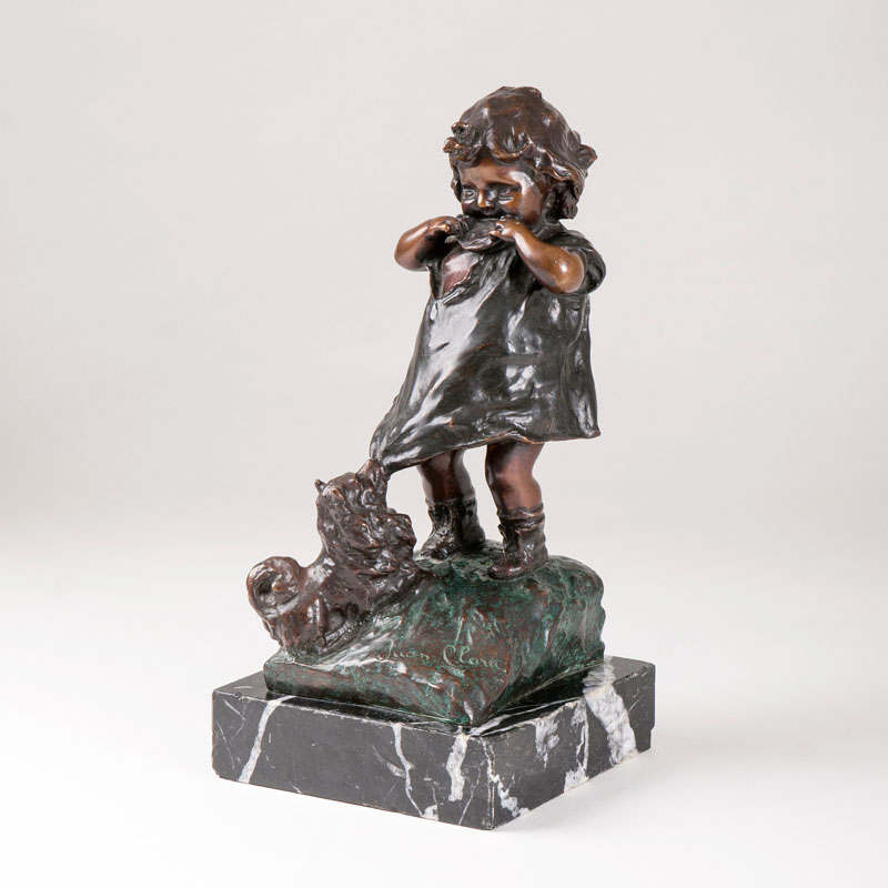 A Goldscheider bronze sculpture 'Little girl with a dachshund'