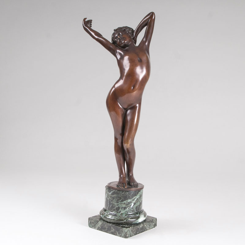 A bronze sculpture 'awakened nude'