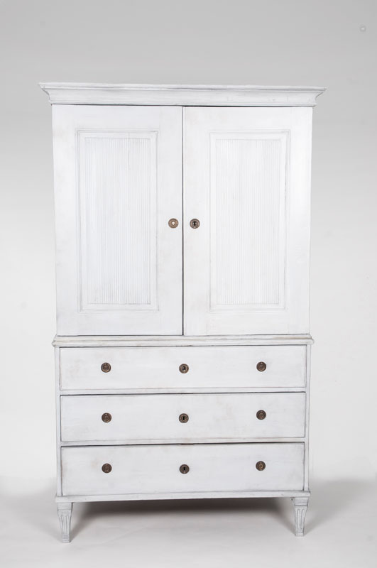 A painted cabinet-on-chest in Gustavian style