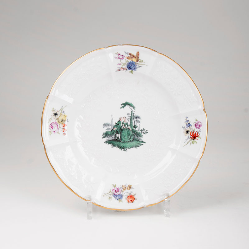 A plate with green Watteau painting