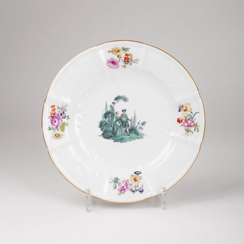 A plate with green Watteau-painting