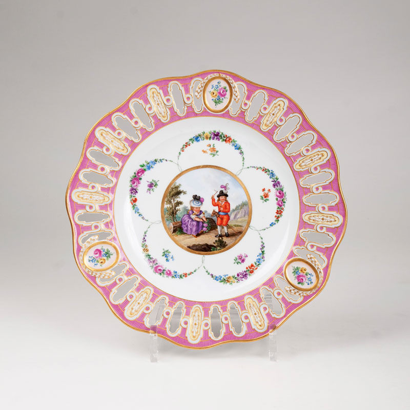 A plate with latticework and a scene of childhood
