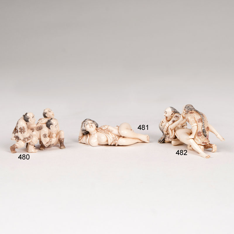 An erotic shunga-netsuke '3 men at loveplay'