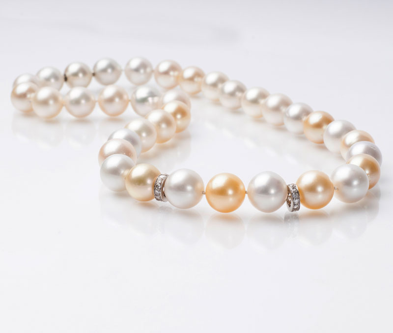 A Southsea pearl necklace with diamond setting