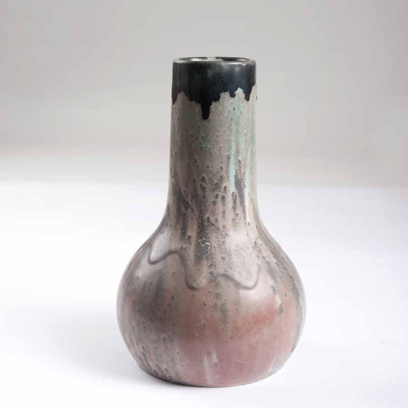 A narrow neck vase with polychrome glaze