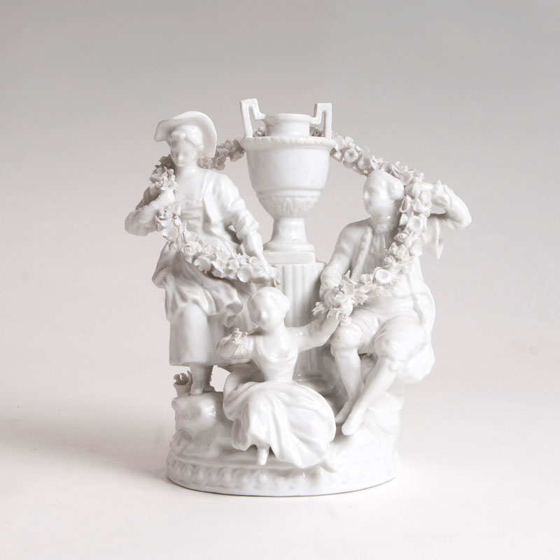 A porcelain group 'Gardener Pair with a Child'