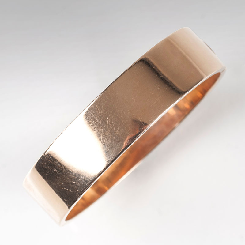 A golden bangle bracelet