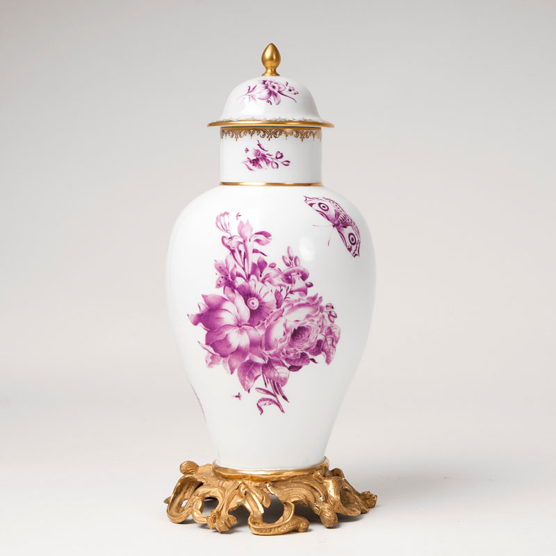 A  lidded vase with flower painting in purple monochrome