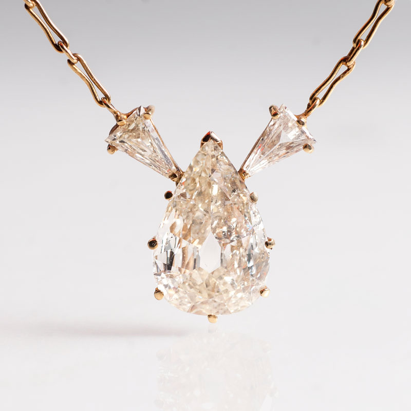 A large fancy diamond as pendant with necklace