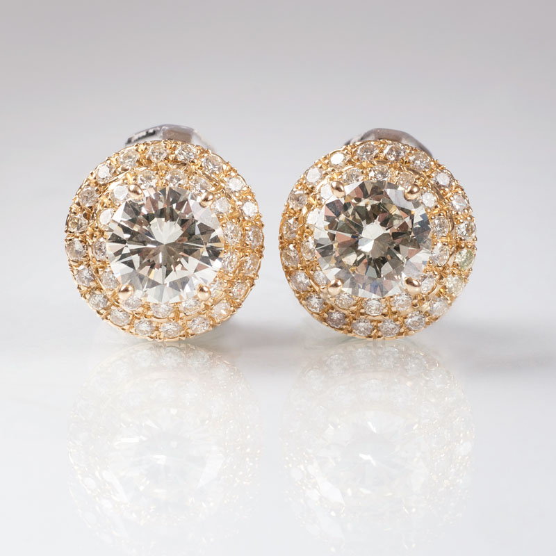 A pair of great solitaire diamond earclips
