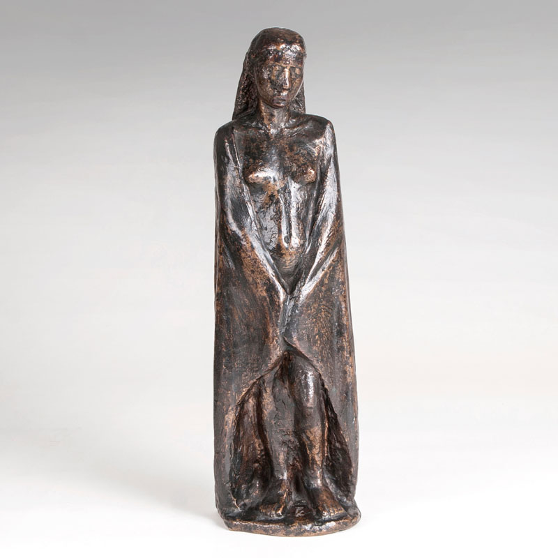 A bronze sculpture 'roman girl with cape'