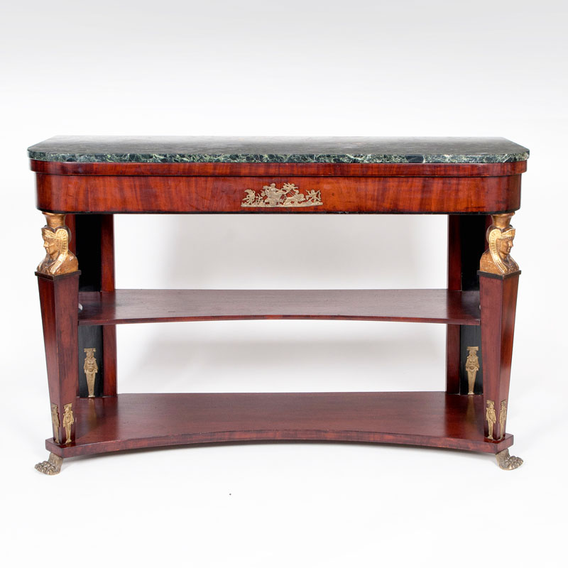 An Empire style console table with sphinx decor