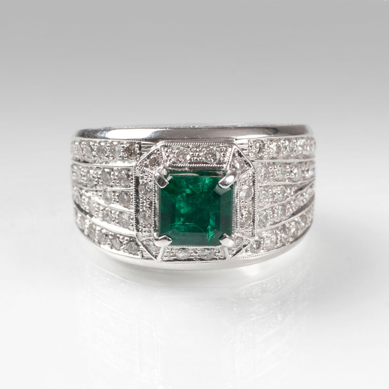 A diamond emerald ring