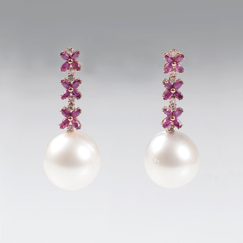 A pair of ruby diamond earrings with Southsea pearls