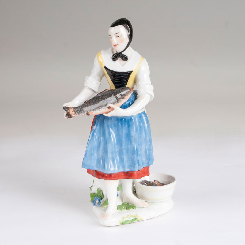 A porcelain figure 'Market woman with a carp'