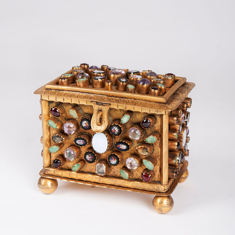 A casket with semi precios stones and pietradura
