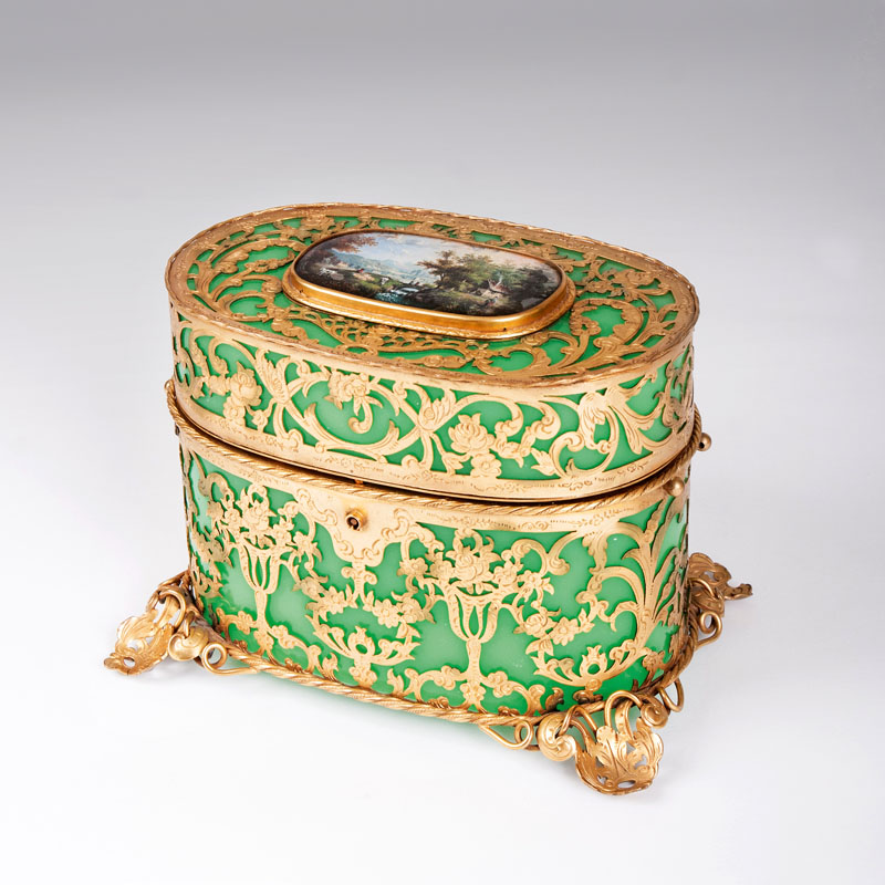 A delicate mounted casket with reverse glass paiting