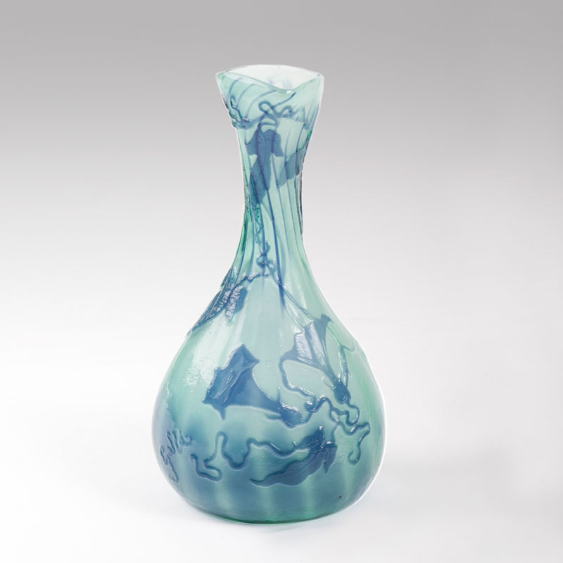 A narrow neck vase with morning glories