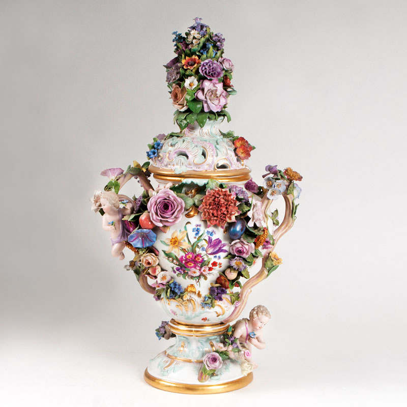 A magnificent potpourri vase with rich sculptural flower decor