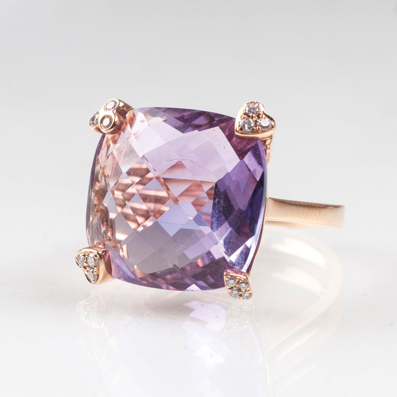 An amethyst diamond ring