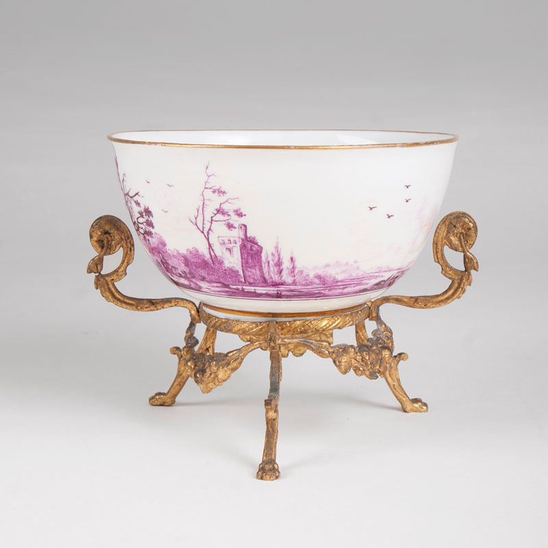 A bronze mounted bowl with landscape in purple monochrome