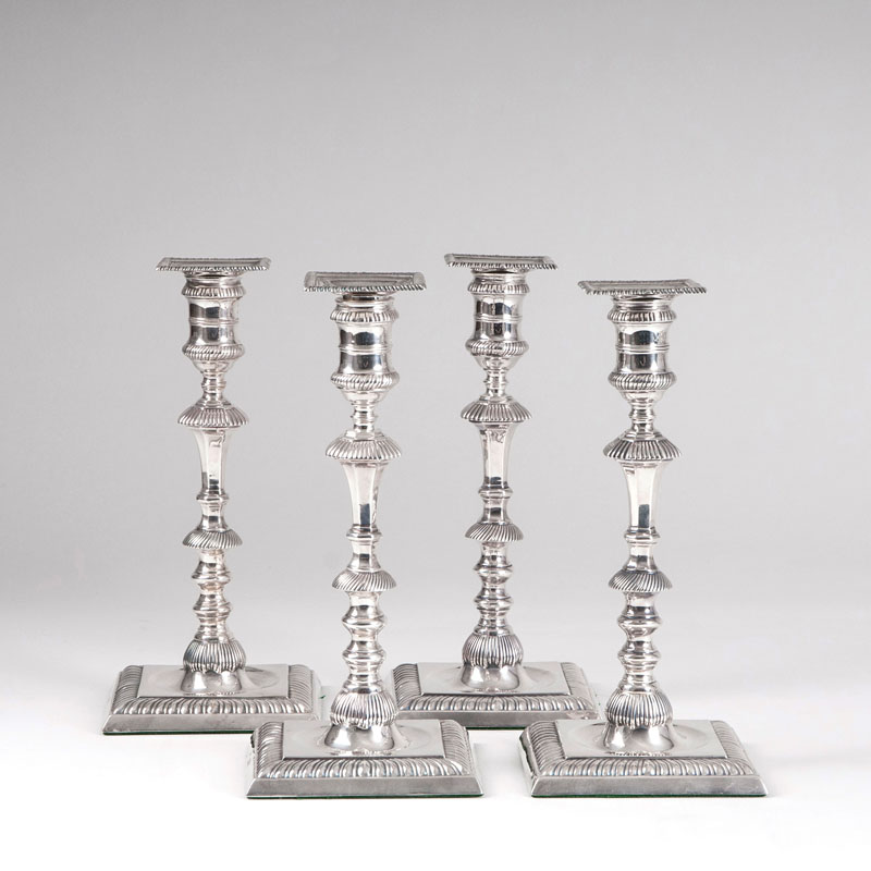 A set of 4 Victorian candlesticks