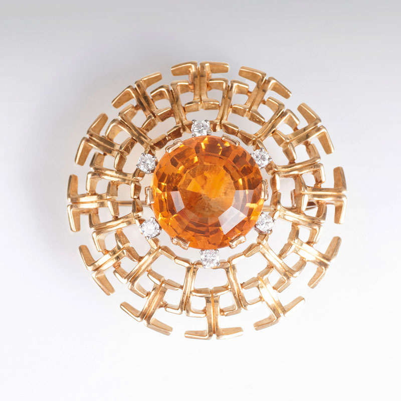 A citrine diamond pendant