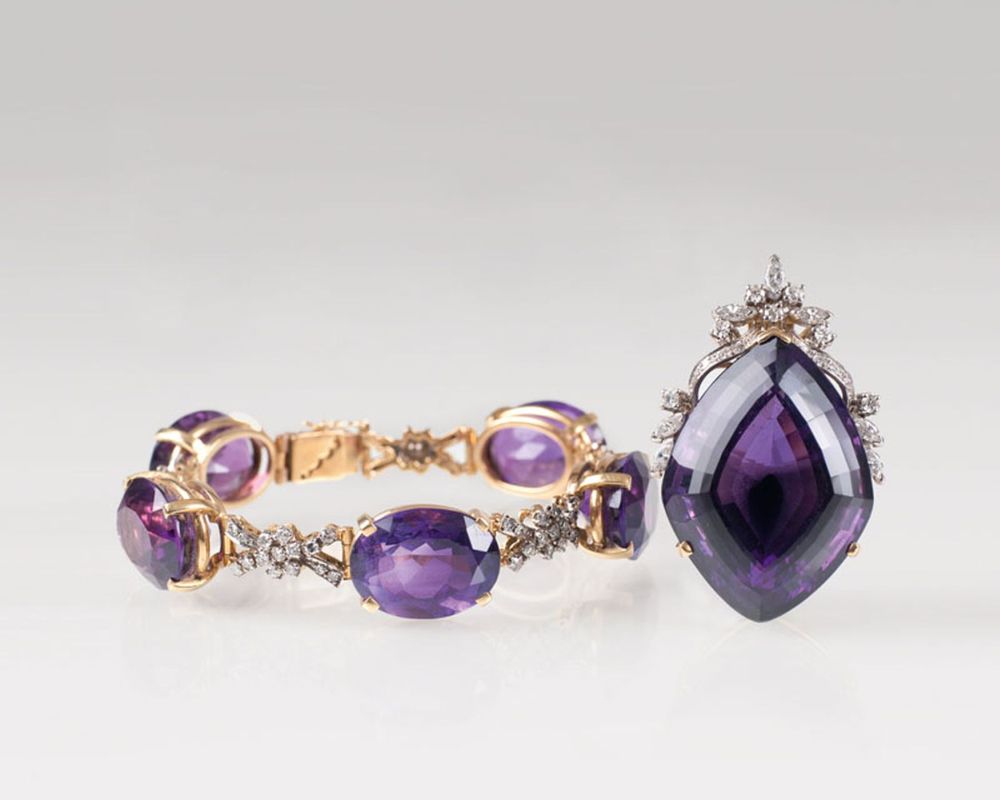A bracelet and pendant with amethyst diamond setting