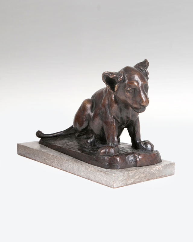 A bronce sculpture of a lion cub, 'Dusselchen'