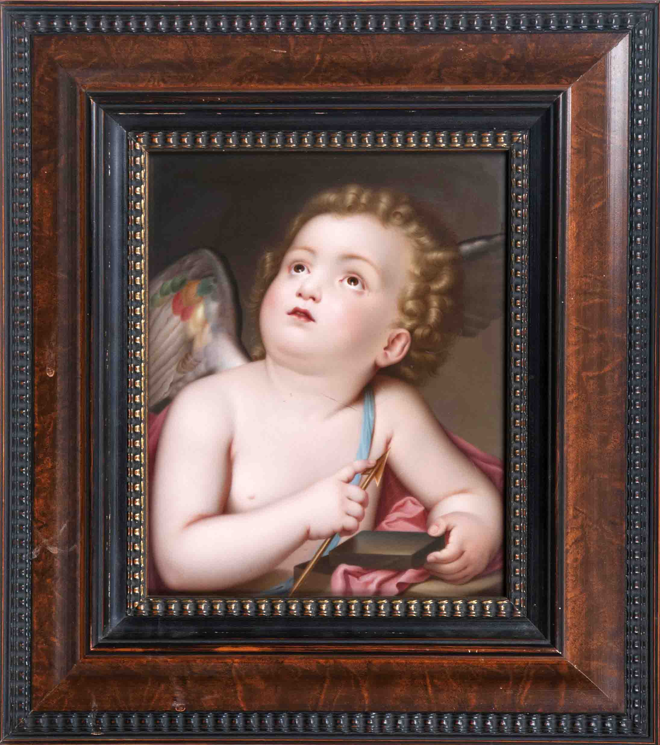 A porcelain plaque 'A little Cupid grinding his bow'